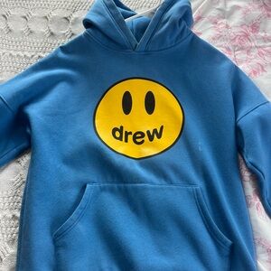 drew house blue hoodie with yellow smile logo